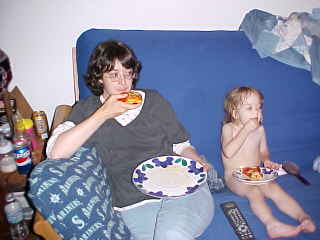 Eating pizza and watching TV with Mommy